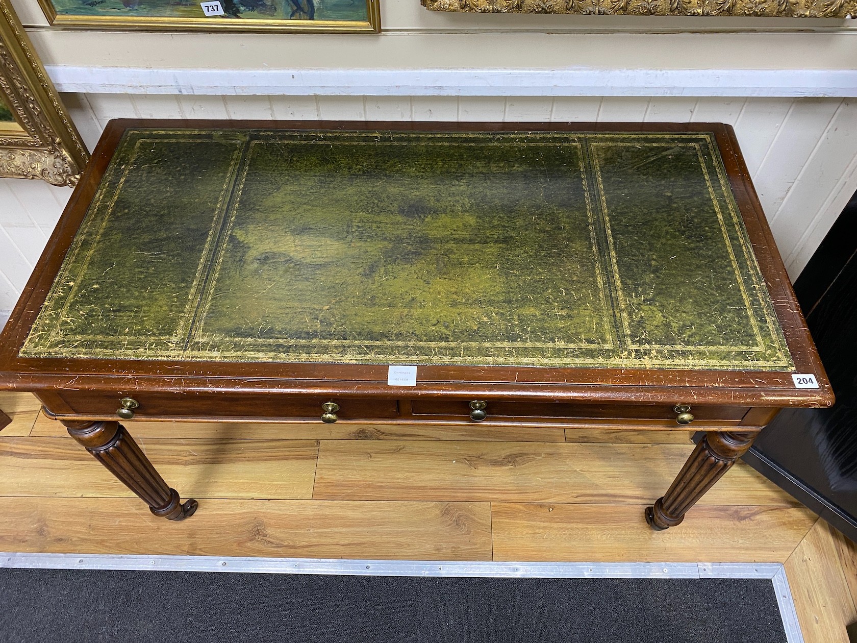 A George IV mahogany two drawer writing table, width 121cm, depth 60cm, height 75cm